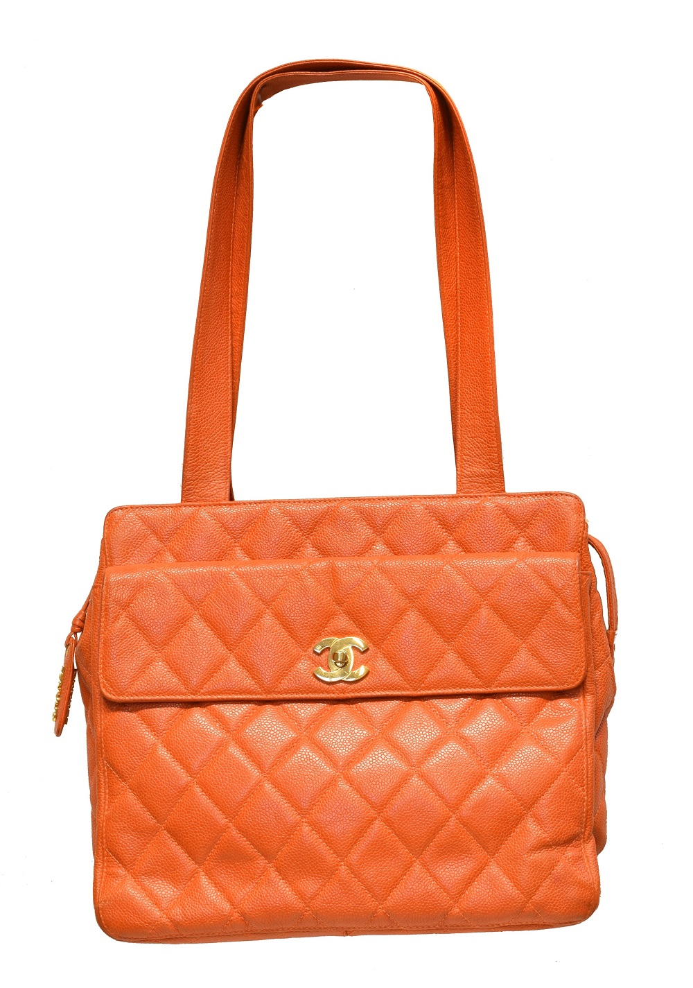A Chanel Front Pocket Turnlock Tote Shoulder Bag, circa 1996-7, the orange quilted caviar calf leather exterior with orange leather strap and gold tone hardware, serial no. 4112158. With maker's authenticity card.  (Qty: 1)  30x25x10cm  Sold for £1,049